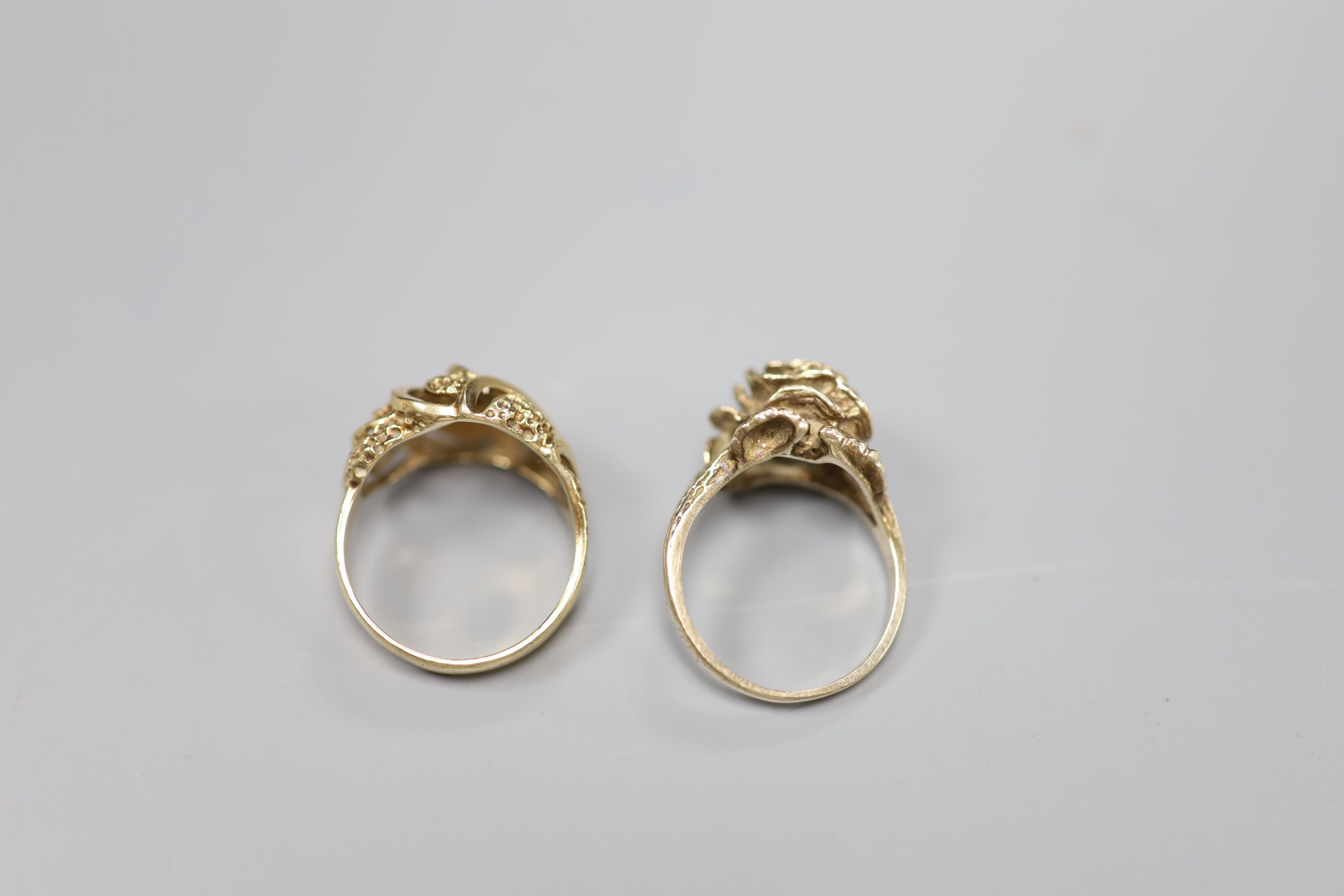 A 9ct plain and textured gold modernist design ring and a 9ct gold rose design ring, gross 11.3g